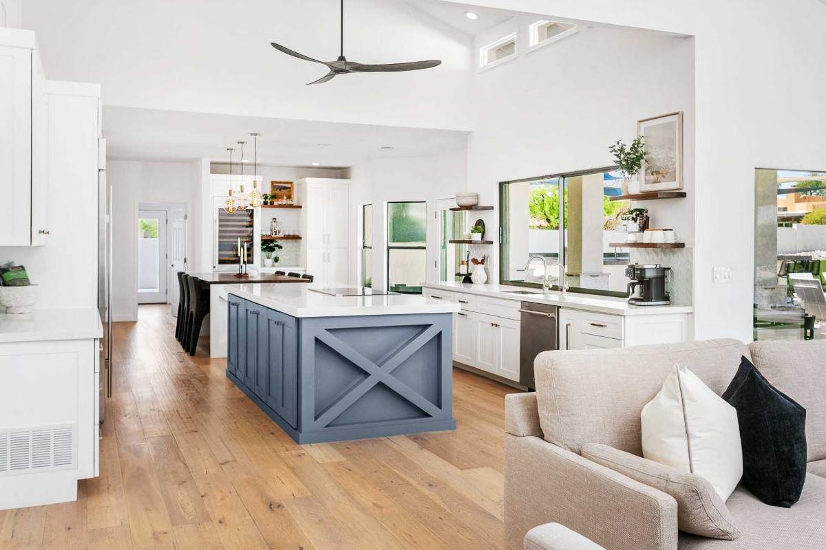 Modern kitchen with high ceilings and natural light