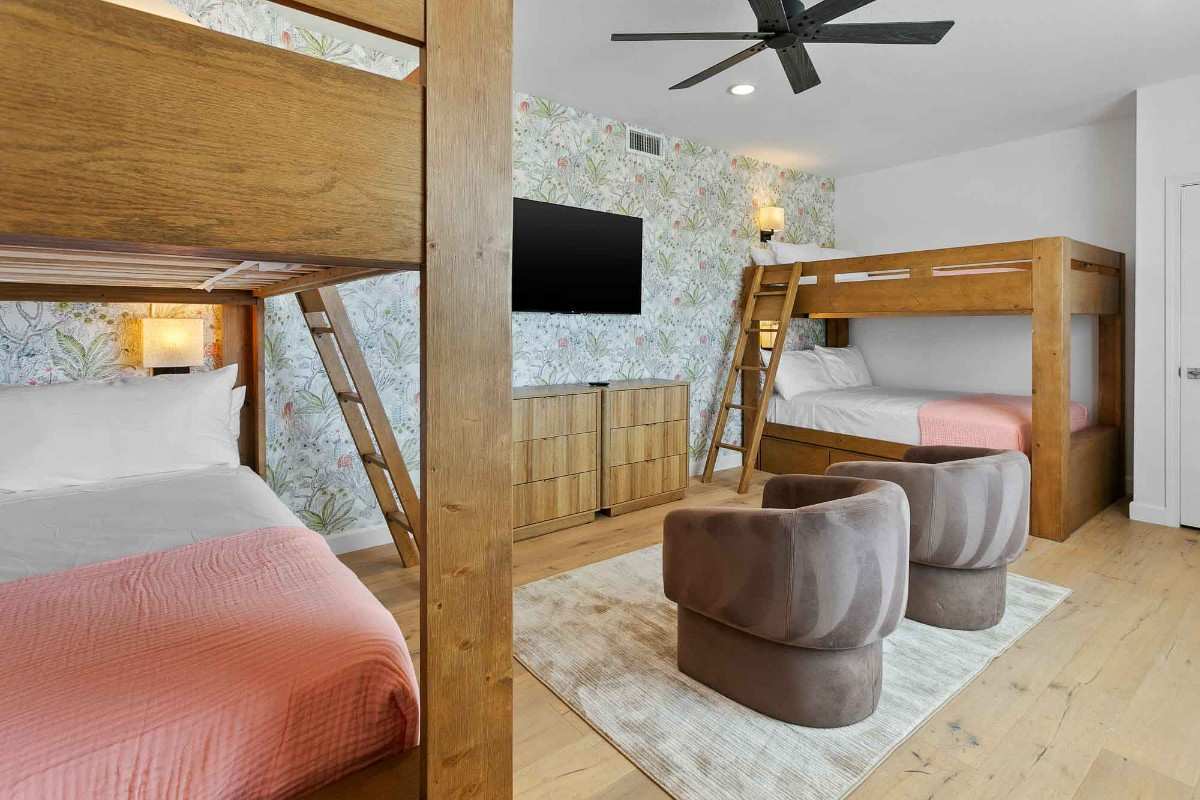 Bedroom with two wooden bunk beds